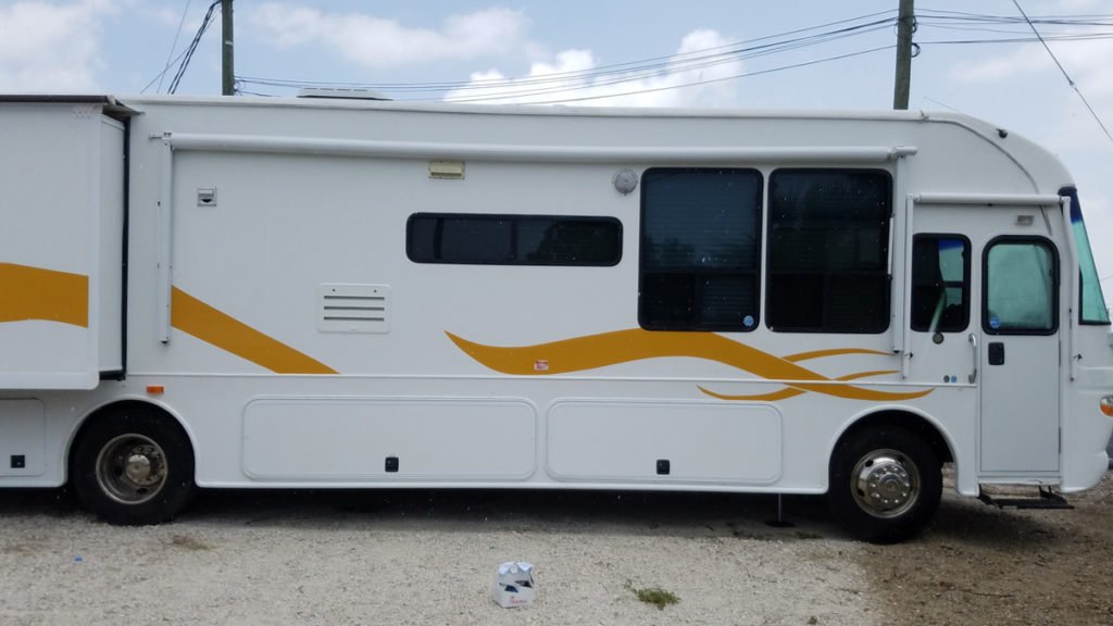 Installing RVPrecision RV Graphics Installation by 10-4 Wraps stripe kit with custom graphics in Destin