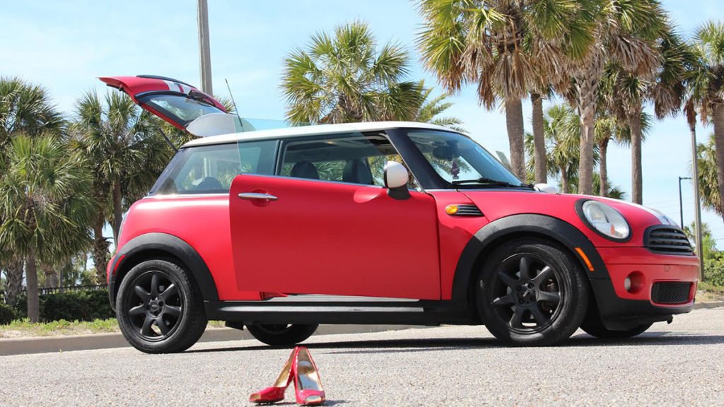 Side view of Satin Red Mini CoopeSide View – Satin Red Mini Cooper Wrap in Destinr with custom wrap