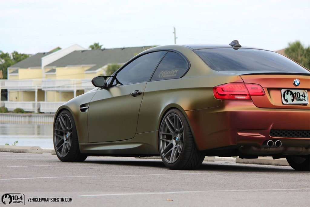 Close-up of Satin Rising Sun colorsSatin Rising Sun Colorshift Vinyl Wrap Texture Detailin (31)hift vinyl wrap texture